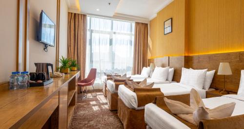 Quadruple Room room in Emaar Legend