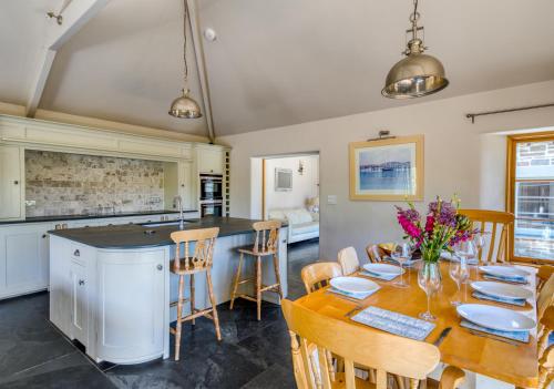 Putsborough Manor 3 Self Catering Cottages with Beach a short walk dog friendly all year, On site Tennis, Play Area, Paddock, Spa baths, BBQ, Private Gardens, Superfast WIFI