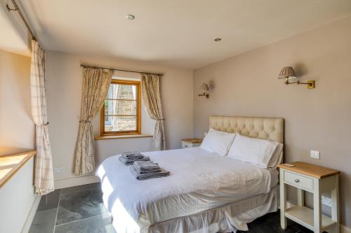 Putsborough Manor 3 Self Catering Cottages with Beach a short walk dog friendly all year, On site Tennis, Play Area, Paddock, Spa baths, BBQ, Private Gardens, Superfast WIFI