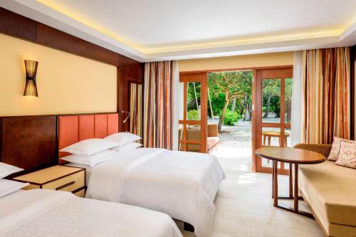 Deluxe Double Room with Two Double Beds and Island View room in Sheraton Maldives Full Moon Resort & Spa