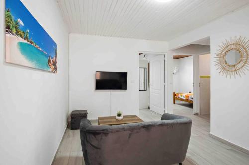Koplietošanas atpūtas telpa ar TV, Le Cataleya - Résidence Terre et Truffes (Le Cataleya - Residence Terre et Truffes) in Le Lamentin