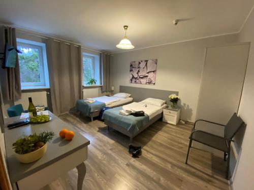 Quadruple Room with Two Bedrooms image 3