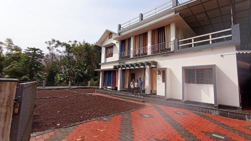 A szálláshely kívülről, 215 négyzetméteres, 3 hálószobás Ház 3 fürdőszobával Panamaram területén (AMMU'S HOME STAY provides an authentic homely stay) in Panamaram