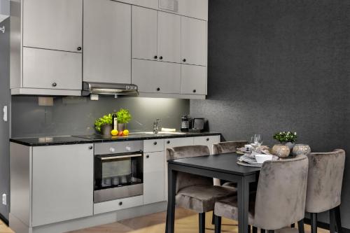 Origo Leilighetshotell in แดรมเมน