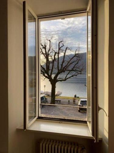 razgled, Meraviglioso appartamento fronte lago con climatizzatore in Bissone