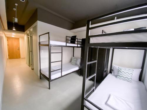 The Grid Co-Living Managed by HII Room Type - Quadruple Room
