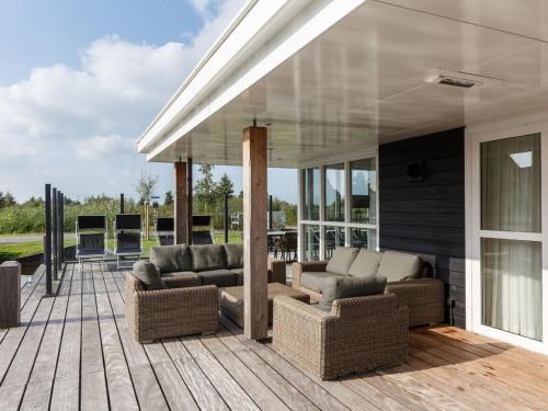 Beautiful villa with sauna and unobstructed view, on a holiday park in Friesland