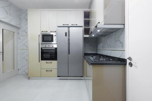 BKT Cribs - Apartments & Suites, Abudža (fotografie 5)