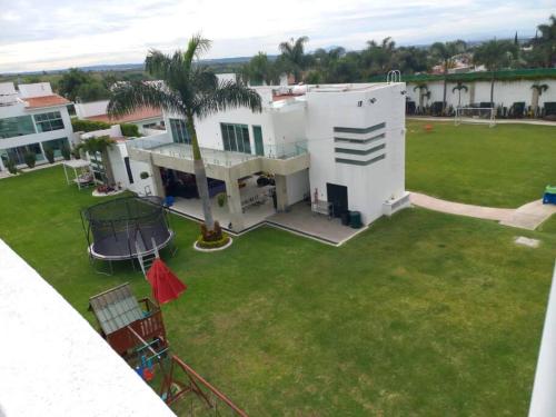 Increible Casa Lomas de Cocoyoc con albercas,tobigan,juegos,tirolesa,cone,fogata,columpios,gimnasio y mas