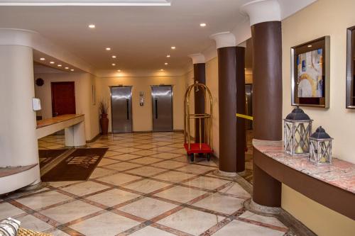 Lobby, Flat c varanda na Praia de Pitangueiras-Guaruja SP near Padaria Bella Guaruja