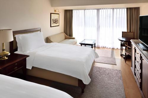 Twin room, deluxe, garden view, balcony