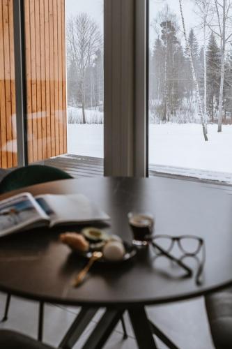 Sniegi design cabin with sauna