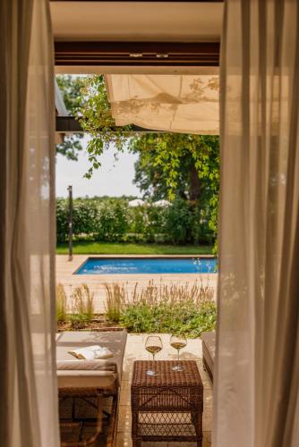 Peldbaseins, Meneghetti Wine Hotel and Winery - Relais & Chateaux in Bale
