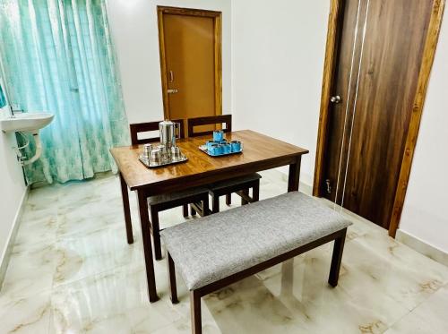 Tirupati Homestay - Shilparamam - Luxury AC apartments by Stayflexi - Fast WiFi, Kitchen, Android TV - Walk to PS4 Pure Veg Restaurant - Easy access to Airport, Railway Station and to all Temples