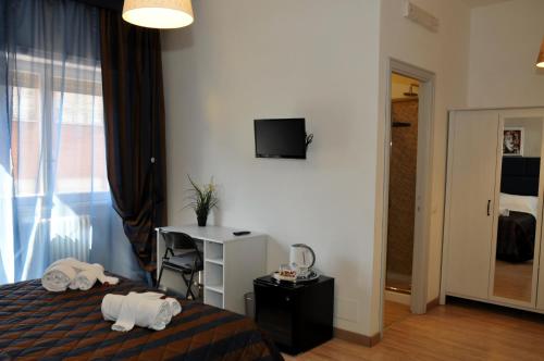 Check-Inn Rooms, Řím (fotografie 9)