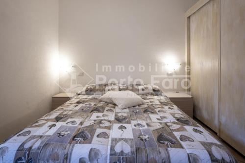 L325 - Bilocale con giardino e vista mare panoramica a Porto Mannu, Palau (foto 7)