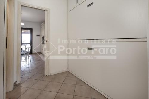 L325 - Bilocale con giardino e vista mare panoramica a Porto Mannu, Palau (foto 8)