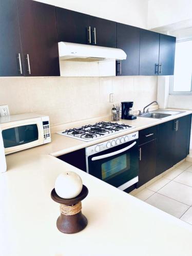 Kitchen, NUEVO EN BOOKING CASA TERRANIUM ACAPULCO DIAMANTE in La Poza