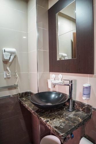 Vonios kambarys, Sahariano hotel City Center in Al Ajunas