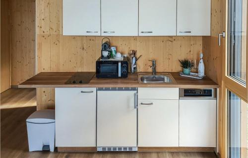 virtuve, Ferienhaus Am Naturbadesee in Eltendorf