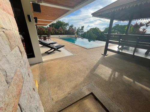 The Carma - stylish and luxury sea view pool villa
