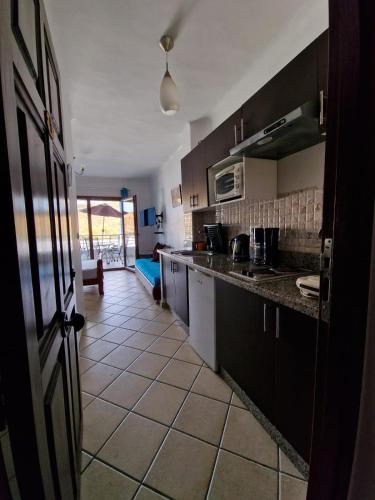 廚房, studio avec piscine et wifi à cabonegro (studio avec piscine et wifi a cabonegro) in 卡博內格羅