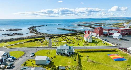 Ocean Views and Gorgeous Design in a Light-Filled 3 BDRM/1.5 Bath Village Home