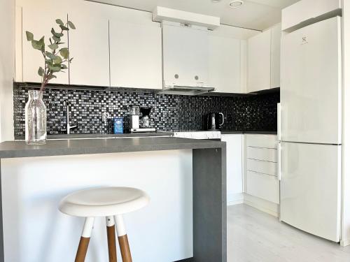 Kitchen, City Home Finland Downtown Suite- Perfect location & Great Amenities in Tampere