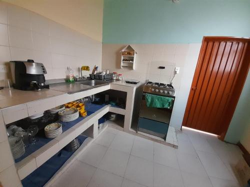 virtuve, HOSTAL HELICONIAS in Páramo