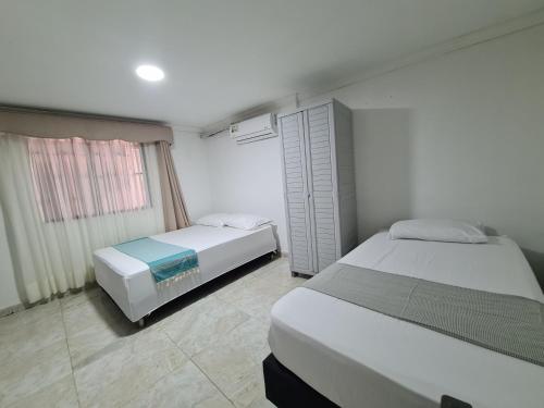 Triple Room with Private Bathroom room in Posada Turística Miss Geidy