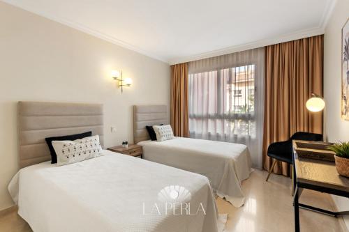 Apartamento La Perla - Tap to explore photos