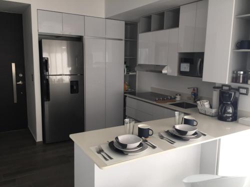 Kitchen, Apartamento moderno 1 habitacion y 1 bano, area Cayala Embajada USA in Zone 16