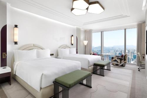 Grand Masters Queen Room with Two Queen Beds and City View
