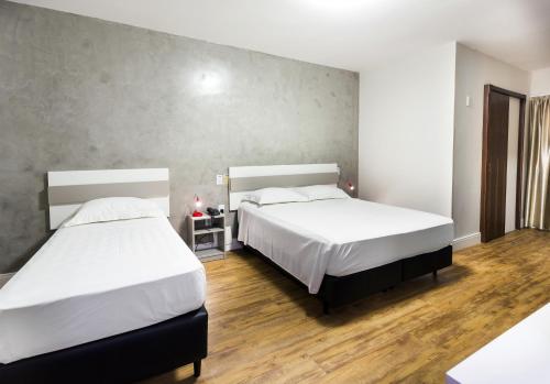 H Hotel HM Praia Hotel is conveniently located in the popular Balneario Camboriu area. Both business travelers and tourists can enjoy the hotels facilities and services. Free Wi-Fi in all rooms, 24-hour fron