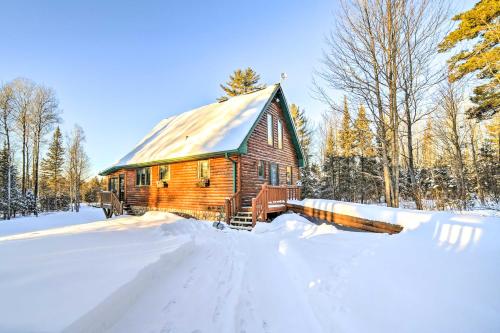 . Iron River Cabin Rental with Fireplace and Deck!