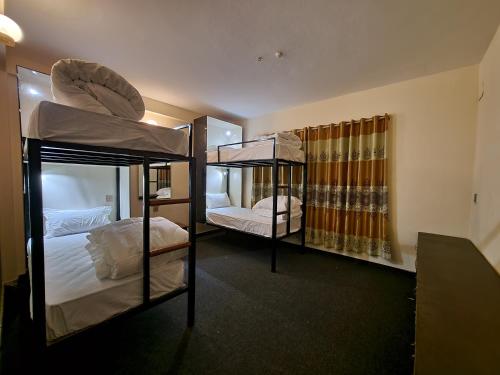 Single Bed in Dormitory Room