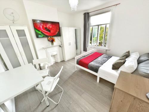 Luxurious House near Excel- Air Conditioning, 9 Beds, 2 Baths, Garden, fast WiFi, Londyn (zdjęcie 8)