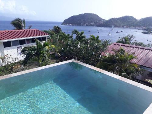 Bungalow mérou waliwa vue idyllique sur la baie des Saintes