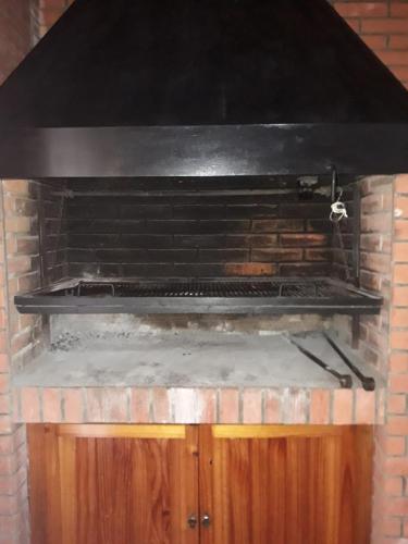 Gran monoambiente con parrilla