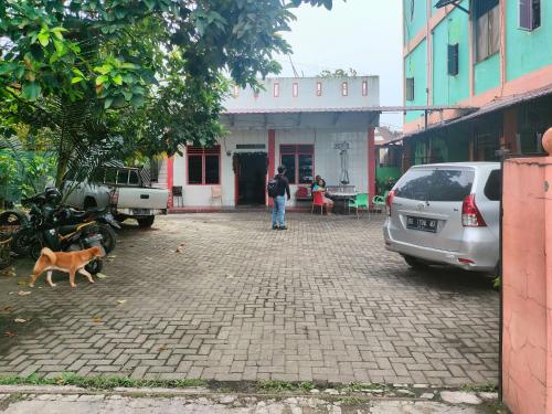 Exterior view, Johje Guest House Medan Mitra RedDoorz in Medan Tuntungan