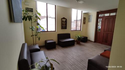 Shared lounge/TV area, Apart Cayambe in Cayambe