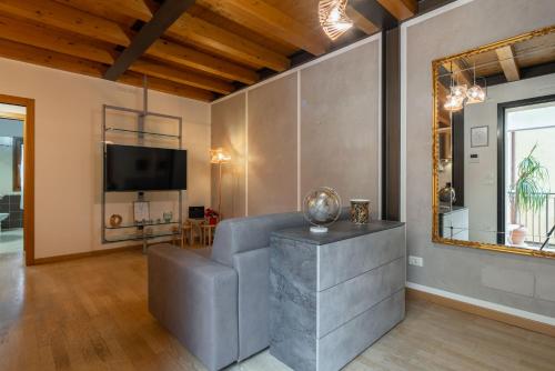 Közös társalgó / TV, [Venezia-Suite Hemingway]a pochi passi Outlet in Noventa Di Piave