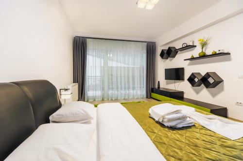 Green Studio - located by the forest, near AFI Mall, and moments away from The Old Town, Braşov