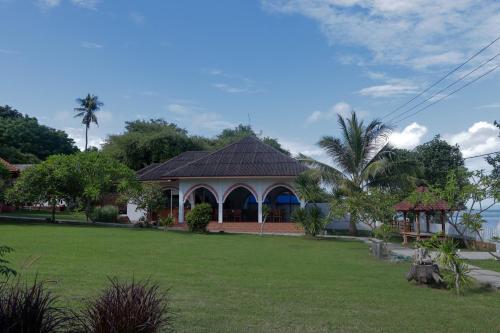 Yut's Inn Flower Paradise Gili Gede