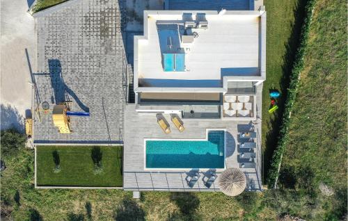 Gorgeous Home In Kucine With Heated Swimming Pool