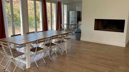 Koplietošanas atpūtas telpa ar TV, Le Moulin de Prades 4 étoiles logement entier Parc Naturel Haut Languedoc - Salagou (Le Moulin de Prades 4 etoiles logement entier Parc Naturel Haut Languedoc - Salagou) in Dio-et-Valquieres