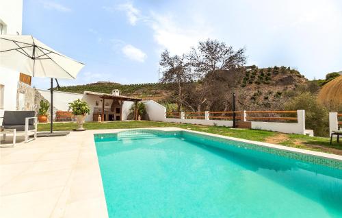 Amazing Home In Mezquitilla With Swimming Pool