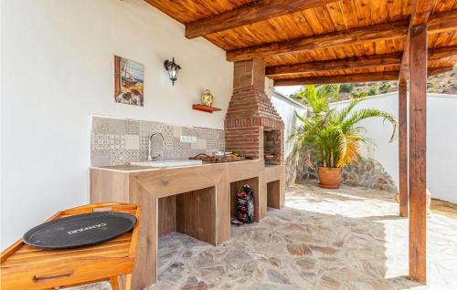 Amazing Home In Mezquitilla With Swimming Pool