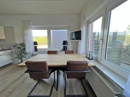 Deichblick 4 in Norddeich- Urlaub und Erholung am Strand in Norden, Deutschland