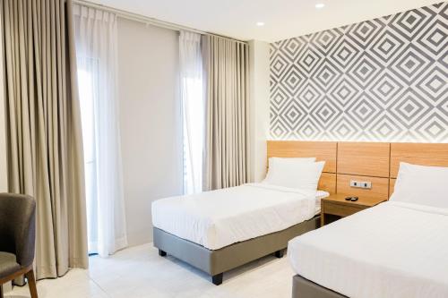The Manaoag Hotel Room Type - Deluxe Twin Room